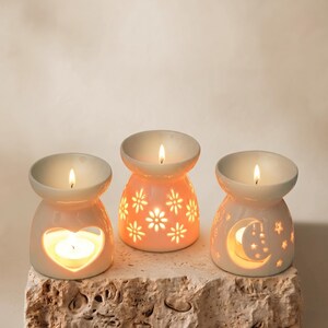 Quemador de aceites esenciales de cerámica, portavelas para velas pequeñas, calentador de cera derretida, difusor de aromaterapia para el hogar, spa, yoga, decoración, diseño floral con forma de luna y corazón.