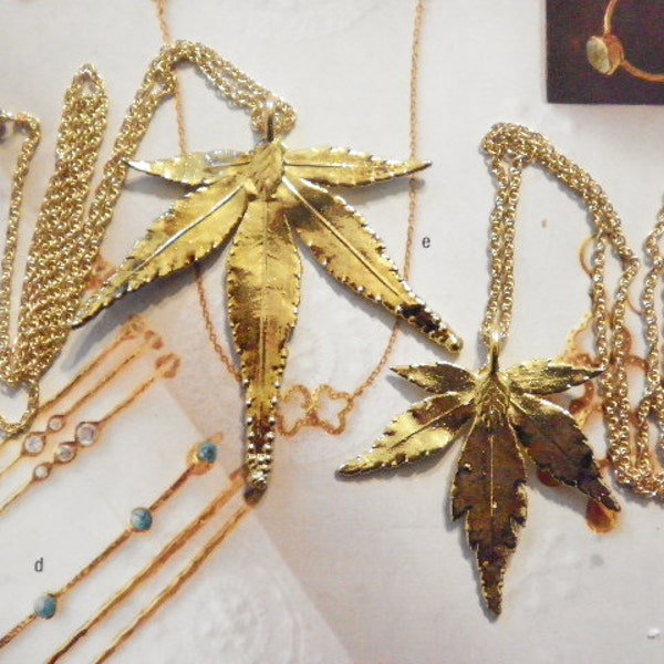 1 Set of Goldplated Original 60s His and Her's Marijuana Leaf Necklaces