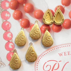 3 Vintage Brass 17mm Teardrop Lockets with Hearts and Flowers Design