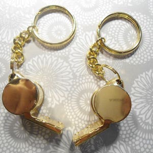 2 Goldplated Loud Whistle Key Chains