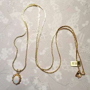 1 ciondolo austriaco in pietra preziosa opale di fuoco 6x8mm su una catena placcata oro da 18 "