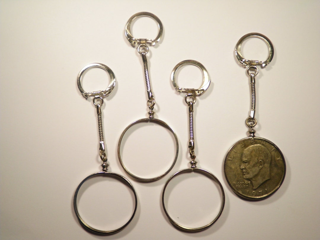 1 Silverplated U.S. Eisenhower and Liberty Dollar Dollar Coin