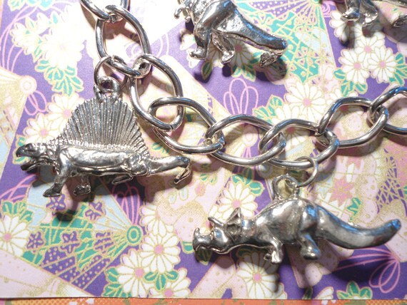 1 Set of Silverplated Dinosaur Bracelet and Earri… - image 2