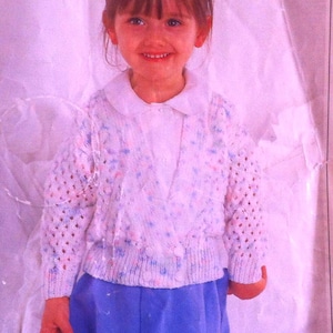 P628 Peter Pan pdf Knitting Pattern.  Girls/Baby crossover lacey cardigan in double knitting wool.  16-24&quot; (41-61cms)
