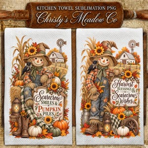 May include: Two white kitchen towels featuring fall-themed illustrations of scarecrows, pumpkins, sunflowers, and farmhouses. The left towel reads 'Scarecrow Smiles & Pumpkin Piles' and the right towel reads 'Harvest Blessings & Scarecrow Wishes'.