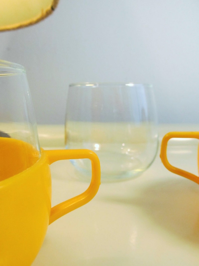 2 Vintage heat resistant glass and plastic cups Yellow color Etsy