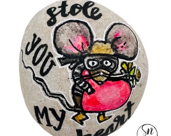 Hand-painted stone with mouse, flower, heart, "You stole my heart."