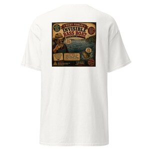 May include: A white t-shirt featuring a graphic on the back with the text Dicky Fiddles Invisible Bass Boat. The design includes an illustration of a person in a hat pointing, a faint outline of a boat on water, a jumping fish, and various text labels.
