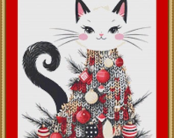 May include: A white cat with black ears and a black tail is dressed as a Christmas tree. The cat is wearing a white and gold sweater with red and white baubles. The cat is sitting on a white background.