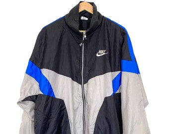 nike shell suit jacket