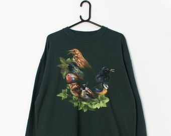 Vintage forest green sweatshirt with bird graphics, 90s - XL