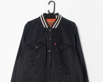 Vintage Women's Levis varsity bomber style jacket in black with orange lining - XL / 2XL