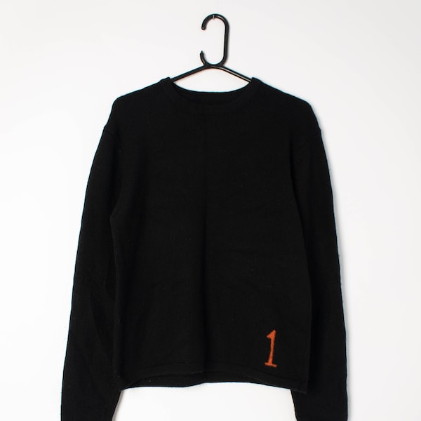 Pull femme en laine mérinos uni noir avec 1 détail orange fluo - Medium