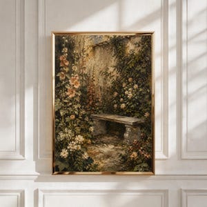 May include: A framed wall art print depicting an oil painting of a stone garden bench nestled among tall pink hollyhocks and lush green climbing vines against a weathered wall. The artwork features a muted colour palette of earthy tones and soft pinks.