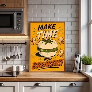 May include: A rectangular wall poster with a yellow background featuring a central white tomato-shaped kitchen timer. Three cartoon toast slices with faces and limbs are running around the timer. The text reads MAKE TIME FOR BREAKFAST.