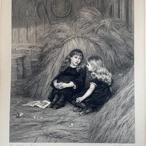 May include: A black and white engraving depicting two children with long hair sitting on a barn floor next to large haystacks. One child wears a dark dress with white lace trim, while the other sits nearby. An open book and an apple lie on the floor.