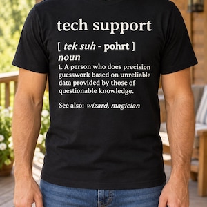 May include: A black short-sleeved t-shirt featuring white text that reads: tech support [ tek suh - pohrt ] noun 1. A person who does precision guesswork based on unreliable data provided by those of questionable knowledge. See also: wizard, magician.
