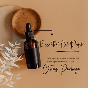 May include: A brown glass bottle with a black label and a dropper top. The bottle is sitting on a cork coaster and a light gray surface. The text "Essential Oil Profile" and "Citrus Package" is written in black cursive script.
