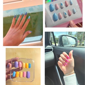 May include: A collection of press-on nails featuring various designs including blue and white stripes, polka dots, and solid pastel colors like pink, yellow, orange, and purple. The nails are displayed in clear plastic packaging and on fingers.