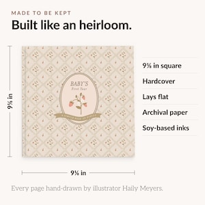 May include: A square 9 1/8 inch by 9 1/8 inch hardcover baby book with a beige diamond pattern and strawberry illustrations. The cover features the text 'BABY'S First Year' and 'A SIMPLE BOOK OF PIECES'. It is made with archival paper and soy-based inks.