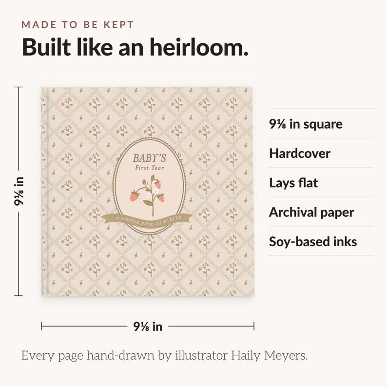 May include: A square 9 1/8 inch by 9 1/8 inch hardcover baby book with a beige diamond pattern and strawberry illustrations. The cover features the text 'BABY'S First Year' and 'A SIMPLE BOOK OF PIECES'. It is made with archival paper and soy-based inks.
