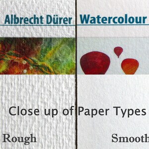 May include: Close-up of two types of watercolor paper. The left side shows a rough surface with a textured pattern. The right side shows a smooth surface with a subtle texture. The text "Fine Art Albrecht D&uuml;rer" and "Watercolour Paper" is visible at the top of the image. The text "Close up of Paper Types" is visible in the middle of the image. The text "Rough" and "Smooth" is visible at the bottom of the image.