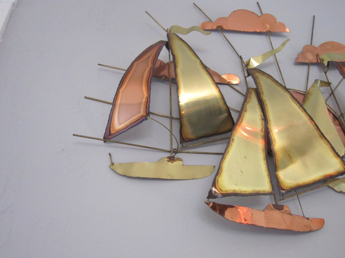 brass copper sailboat wall