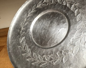 Vintage hand forged tray floral embossed hammered aluminum round tray silver tray scalloped edge metal charcuterie tray.