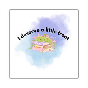 May include: A square sticker featuring a green dragon sleeping on a stack of three books, surrounded by small pink flowers and yellow sparkles against a purple watercolor background. The text "I deserve a little treat" is printed in black.