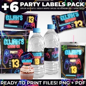 Könnte beinhalten: Ein Party-Etiketten-Set mit Neon-Grafiken von Gamecontrollern und dem Text Elijah's Birthday Level 13. Das Set enthält Verpackungen für Schokoriegel, Chipstüten, Wasserflaschen, Trinkbeutel sowie einen Cupcake-Topper mit einem pinken Strohhalm.