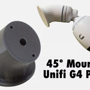 May include: A dark gray 45-degree angled mount for a Unifi G4 PRO camera, featuring a circular base with screw holes. A white Unifi G4 PRO camera is attached to a similar mount, showing the assembly. The text 45° Mount Unifi G4 PRO is visible.