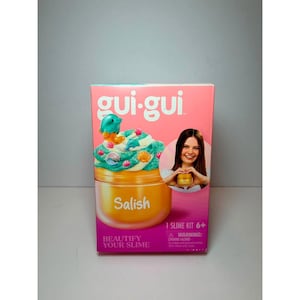 May include: A pink gui-gui slime kit box featuring a graphic of teal and white swirled slime topped with small sea creature charms. The box displays the text Salish, Beautify Your Slime, and a warning label for children under 3 years of age.