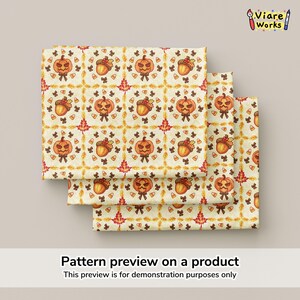 May include: A fabric swatch featuring a repeating autumn pattern on a cream background. The design includes orange jack-o'-lanterns, brown acorns, red maple leaves, and small candy corn icons arranged within a grid of golden wheat stalks.