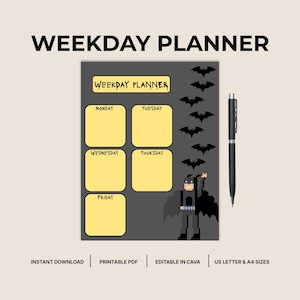 May include: A gray weekday planner page featuring yellow boxes for Monday through Friday, a pixelated superhero character, and black bat silhouettes. The text reads WEEKDAY PLANNER. A black ballpoint pen is positioned to the right of the planner.