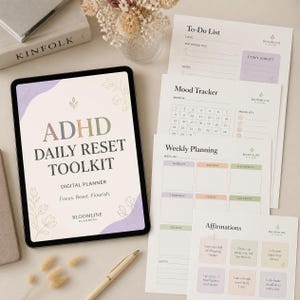 May include: A digital tablet displaying an ADHD Daily Reset Toolkit planner with floral accents, alongside printed planner pages including a To-Do List, Mood Tracker, Weekly Planning sheet, and Affirmations card, all featuring soft pastel colour blocks.
