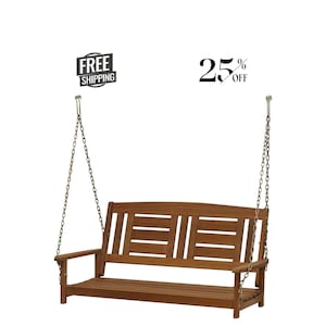 May include: A brown wooden porch swing featuring a slatted backrest and seat, suspended by two metal chains. The text FREE SHIPPING and 25% OFF are visible above the swing. The structure includes two armrests and a curved top rail on the backrest.