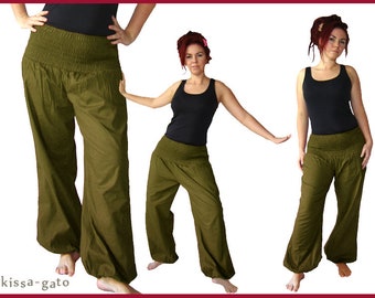 May include: Olive green harem pants with a gathered waistband and loose, flowing legs. The pants are made of a lightweight fabric and have a relaxed fit. The image shows the pants on a person in multiple poses.