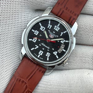 Vintage Seiko Automatic-klocka: Tillverkad i Japan, svart urtavla, brunt läderarmband (38 mm)