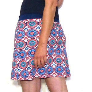 A-line skirt - navy, ornamental pattern in red, white, blue, green ORGANIC