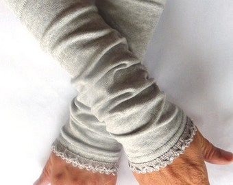 Manicotti, guanti senza dita in grigio chiaro con finiture in grigio chiaro/blu