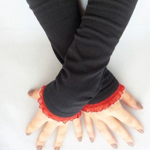 Cuffs, arm warmers, wrist warmers black, red image 1