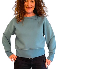 Oversized sweater in aqua with great seams, one size fits all