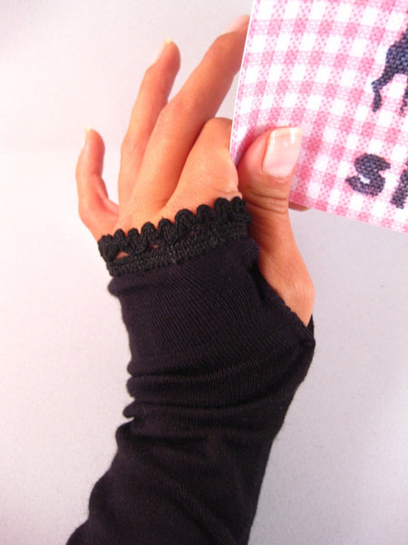 Cuffs, arm warmers with thumb hole black trim image 1