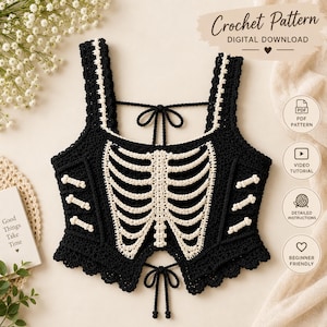May include: A black crochet crop top featuring a white rib cage design on the front, thick shoulder straps, and tie-back closures. The text Crochet Pattern DIGITAL DOWNLOAD is visible at the top, with icons for PDF, video tutorial, and instructions.