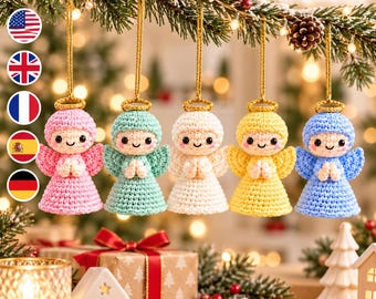 May include: Five crocheted angel ornaments in pink, mint green, white, yellow, and blue, each featuring a gold halo, small wings, and hands clasped in prayer. The text HoneyHook Pattern is visible in the upper right corner.