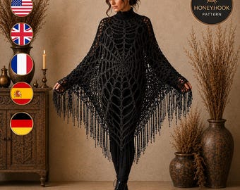 May include: A black crochet poncho featuring a prominent spider web pattern throughout the garment. The piece includes a high turtleneck collar and long, dangling fringe trim along the bottom hem. The text HONEYHOOK PATTERN is visible in the corner.