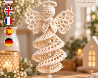 May include: A cream-colored crocheted angel ornament featuring an intricate openwork wing design, a halo, and a spiral skirt. The figure is embellished with small silver beads along the edges and a vertical string of white pearls down the center.