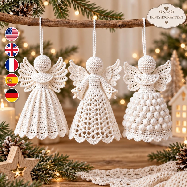 May include: Three off-white crochet angel ornaments hanging from a wooden branch. Each angel features a round head, spread wings, and a unique skirt design: one with solid stitches, one with an open lattice pattern, and one with textured bobble stitches.