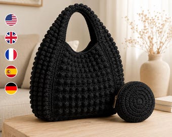 May include: A black crochet handbag with a textured bobble stitch pattern and a matching circular coin purse featuring a gold zipper. The text HONEYHOOKPATTERN is visible in the upper right corner, alongside several circular national flag icons.