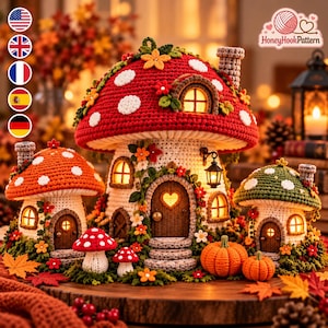 May include: A set of three crocheted mushroom-shaped houses with red, orange, and green caps featuring white spots, illuminated windows, and doors. The houses are decorated with small crocheted flowers, vines, and pumpkins, with a chimney on each.